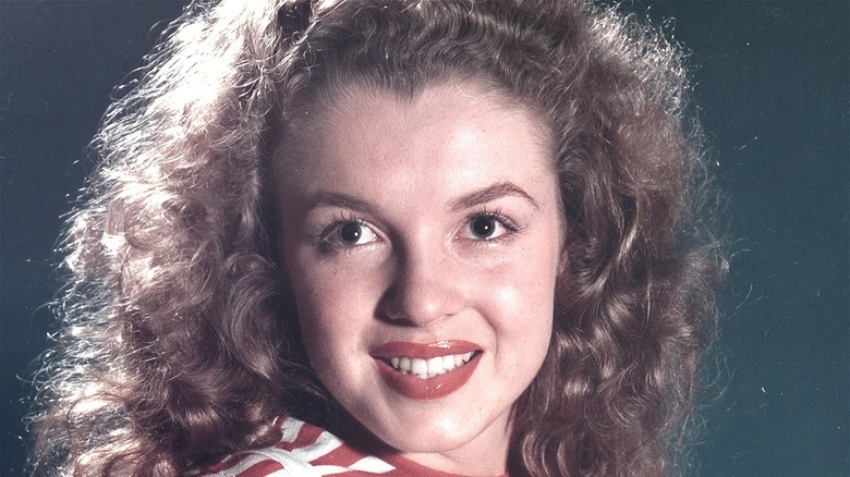 Marilyn Monroe smiling as a young woman