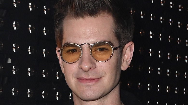 Andrew Garfield wearing yellow glasses