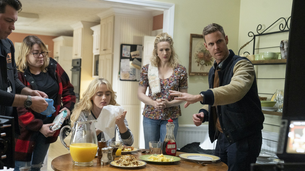 (from right) Co-writer/director Christopher Landon, Katie Finneran and Kathryn Newton with crew members on the set of Freaky.