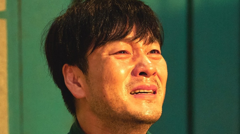 Sang-woo crying