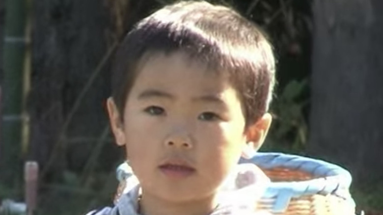 Child looking at the camera in confusion