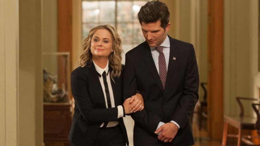 Amy Poehler as Leslie Knope and Adam Scott as Ben Wyatt on Parks and Recreation