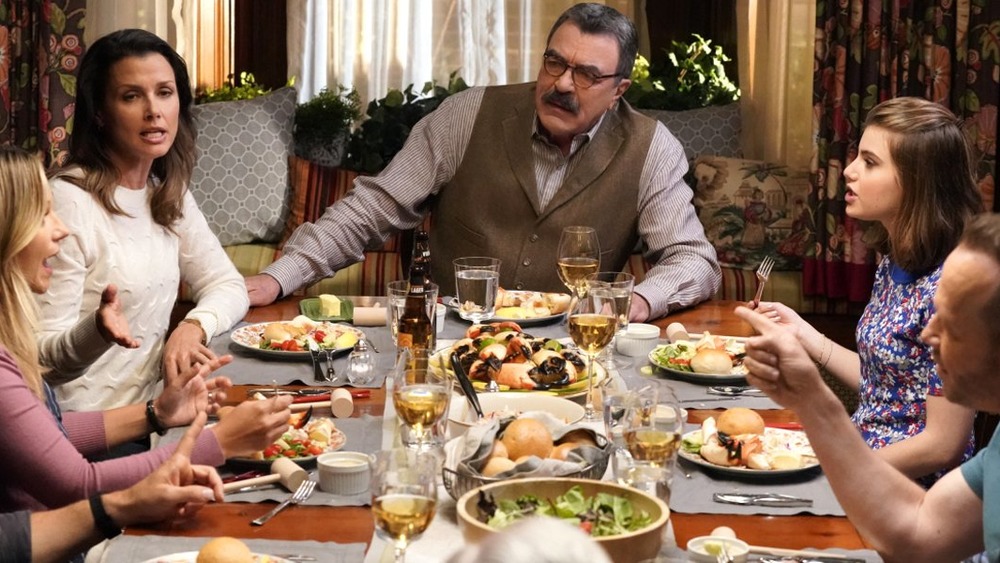 The cast of Blue Bloods in a family dinner scene