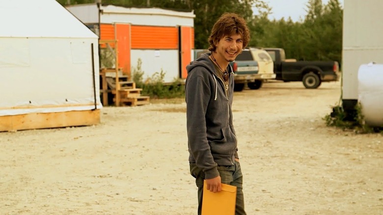 Parker Schnabel holding an envelope