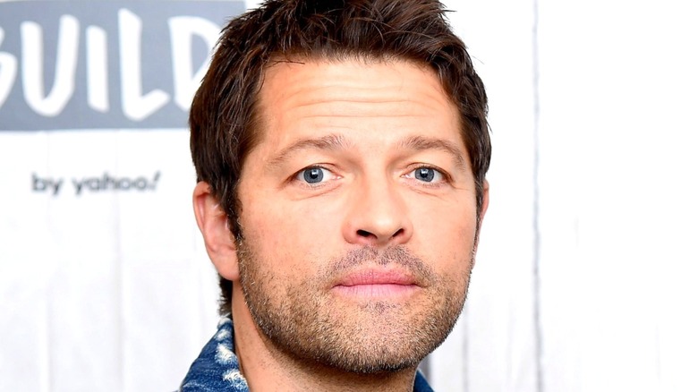 Misha Collins looking into camera