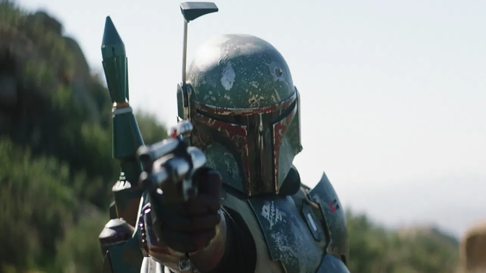 Boba Fett pointing blaster