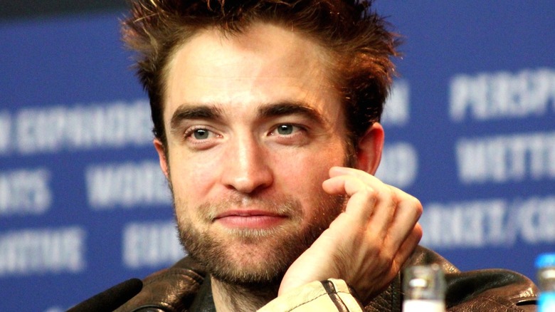 Robert Pattinson smirking