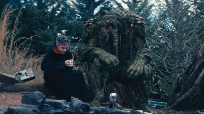Jack and Ted sitting on a log