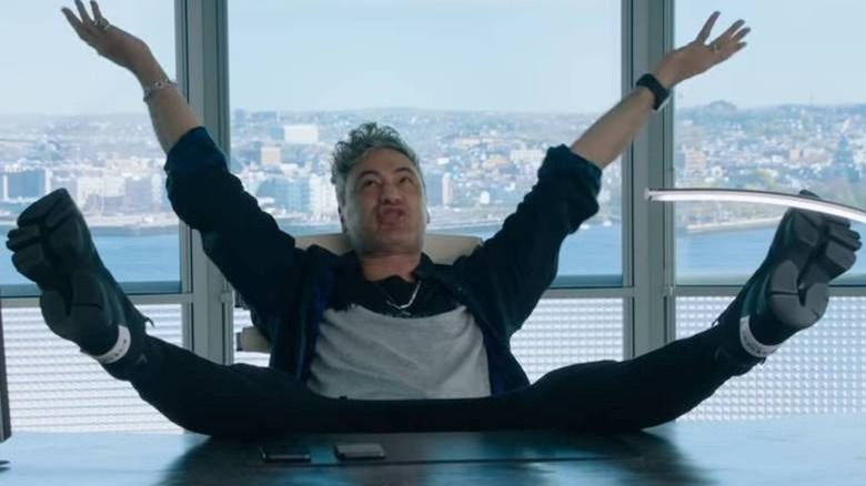 Antoine with his legs on a desk