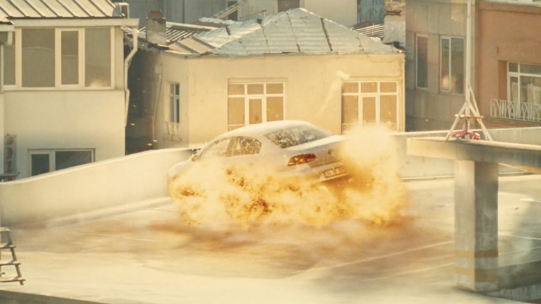 Car exploding on parking building