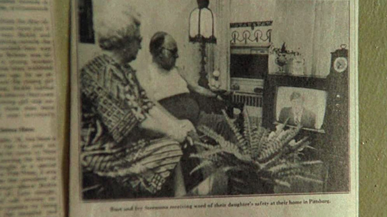 Charles Scorsese (r), in a photo, watches a television news broadcast
