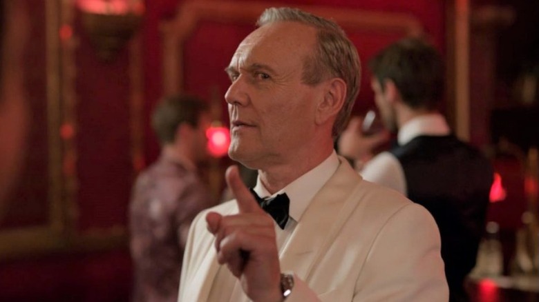 Rupert Mannion points while talking