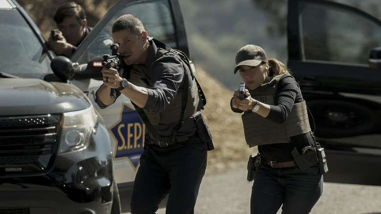 Tony and Mac aiming guns in "The Terminal List"