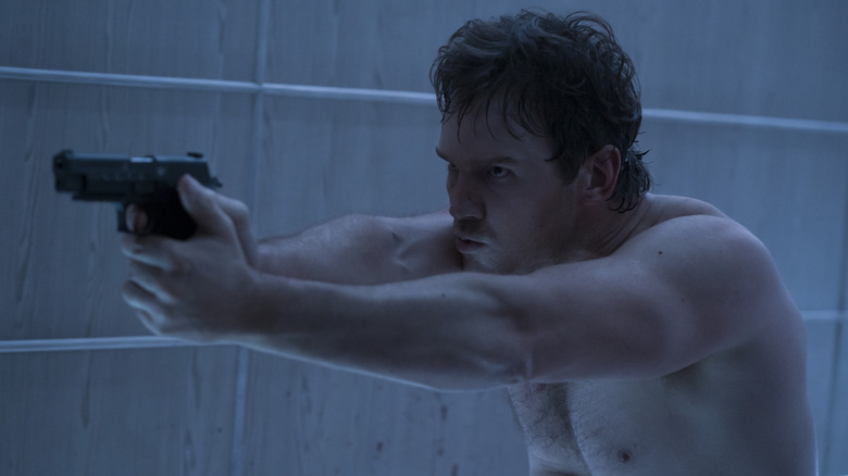 James Reece points a gun in "The Terminal List"
