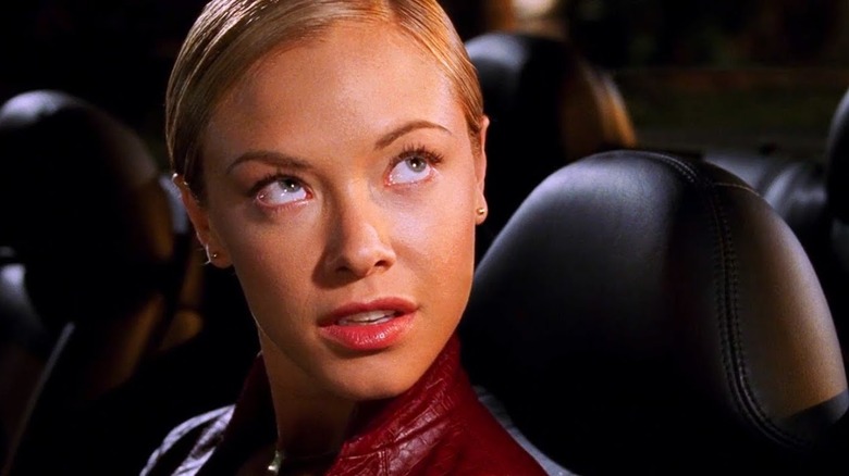 The T-X drives a car