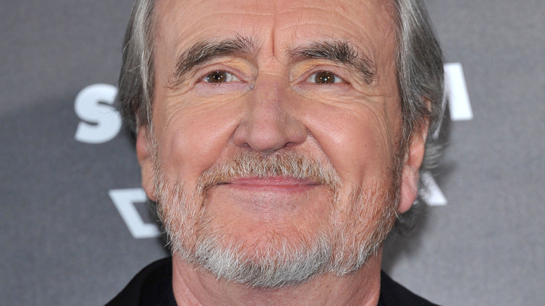 Wes Craven smiling on the red carpet