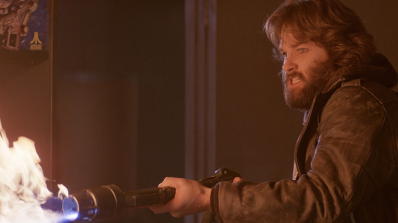 MacReady using a flamethrower in The Thing