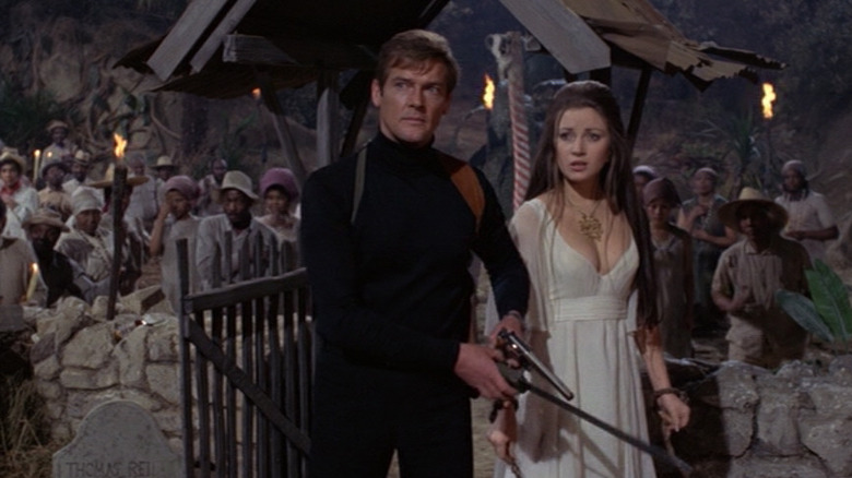 Roger Moore as James Bond and Jane Seymour as Solitaire in Live and Let Die