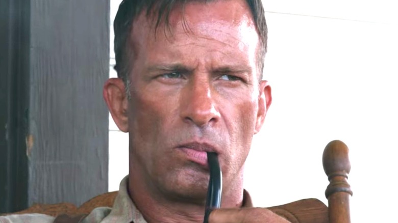 Thomas Jane Wilfred James smoking pipe