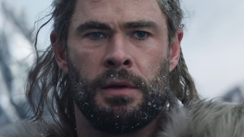 Thor looks alarmed and is snow-covered