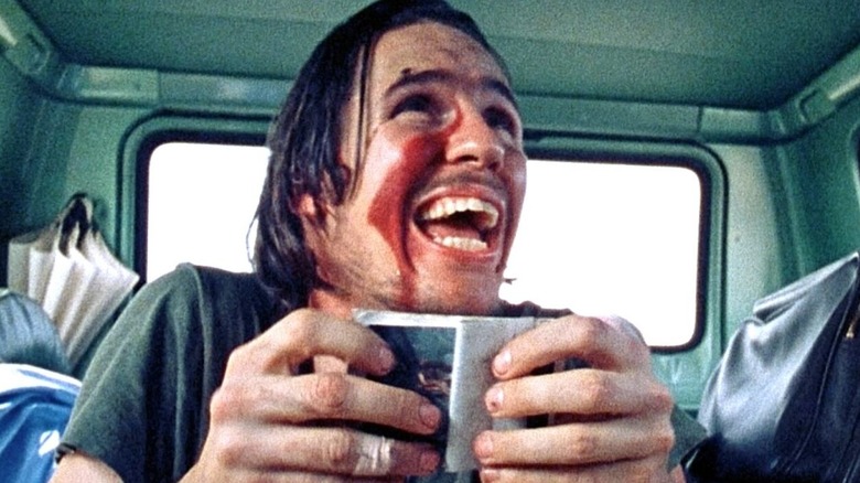 The hitchhiker shows off his wares