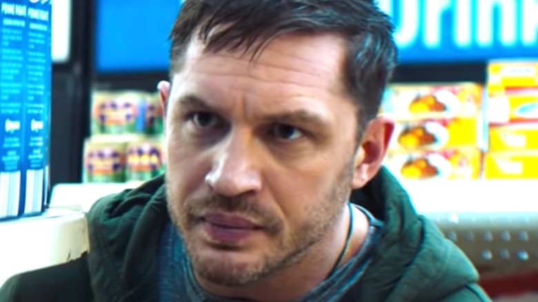 Tom Hardy as Eddie Brock in Venom