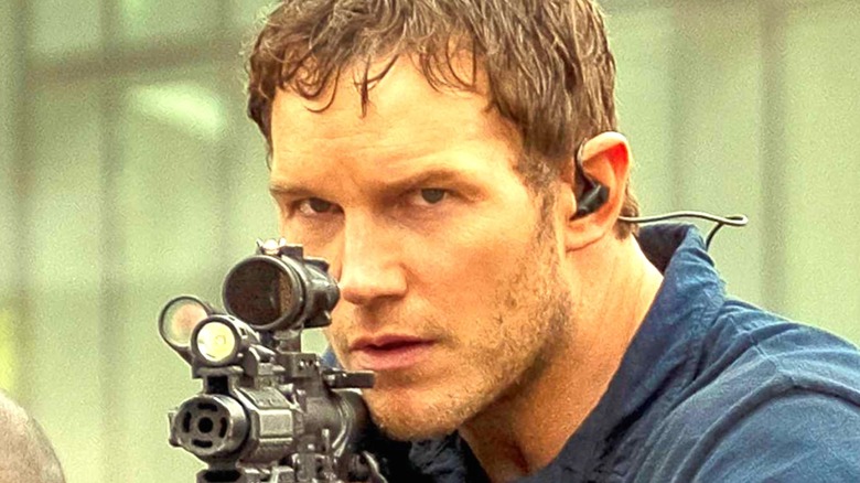 Chris Pratt as Dan with gun