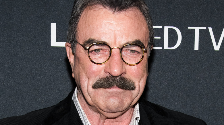 Tom Selleck smiling at event