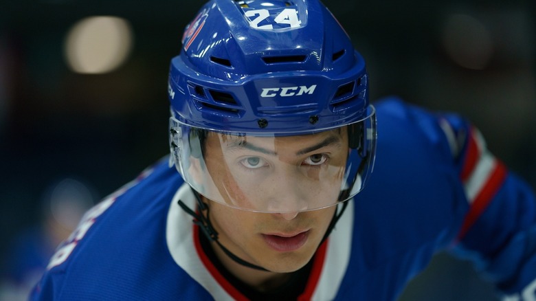 Shane frowning during a hockey game in 