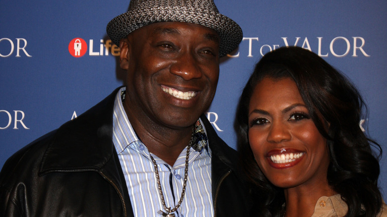 Michael Clarke Duncan and Omarosa smiling