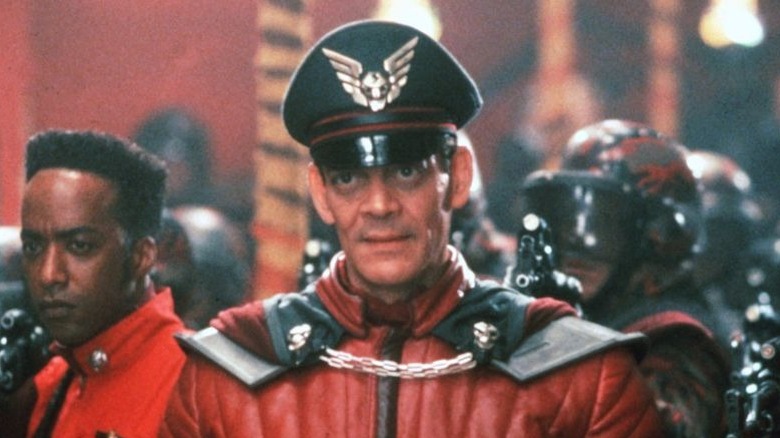Raul Julia as Bison