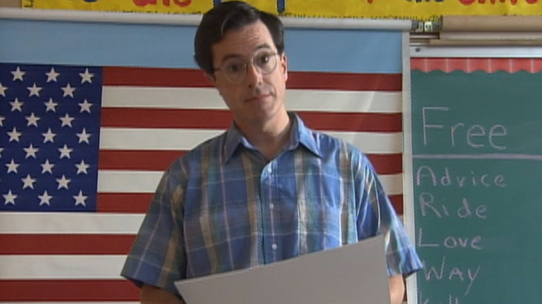 Chuck Noblet standing in front of American flag on "Strangers with Candy" (2006)