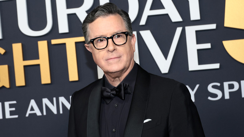 Stephen Colbert posing at SNL50 in 2025
