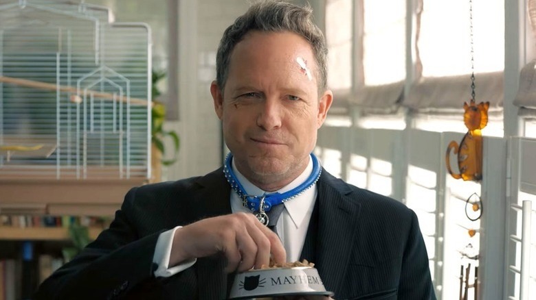 Mayhem eating cat food in an Allstate commercial