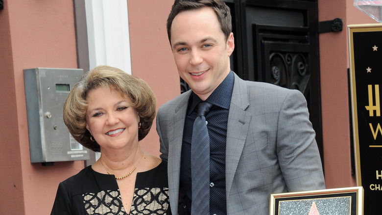 Judy Parsons and Jim Parsons smiling at an event