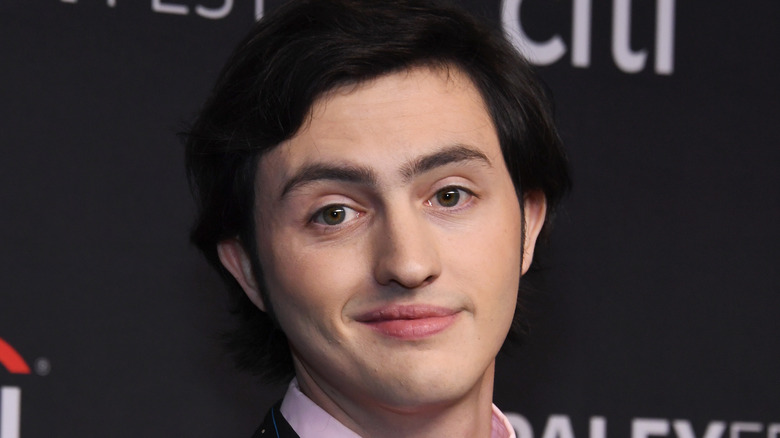 Gianni DeCenzo smiling on a red carpet