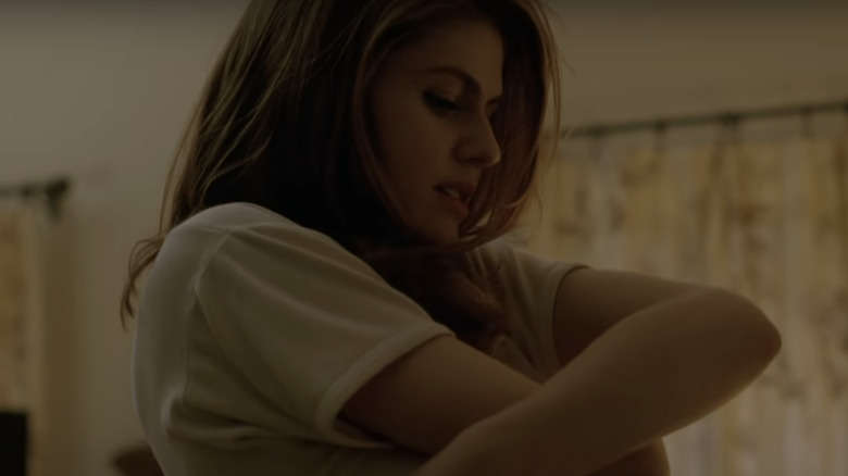 Alexandra Daddario takes her shirt off