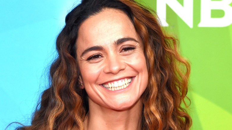 Alice Braga smiling