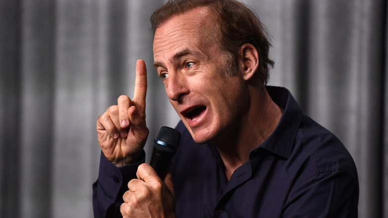 Bob Odenkirk holding finger up