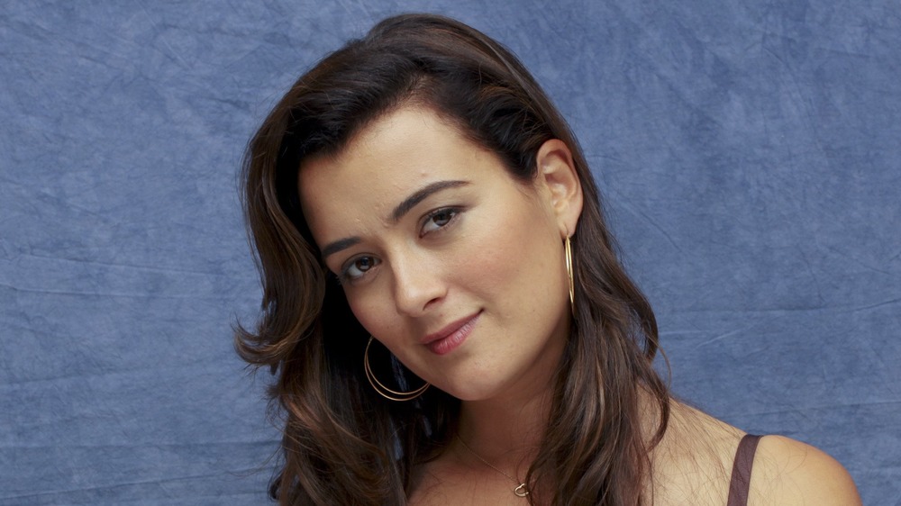 Cote de Pablo head tilted and smiling