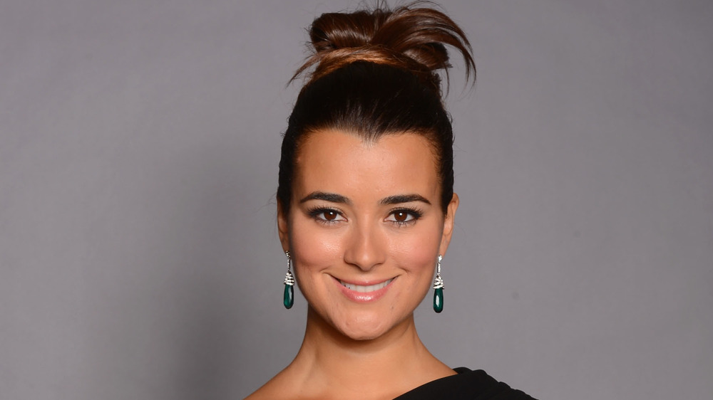 Cote de Pablo smiling bright