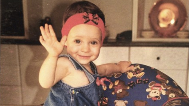 baby Daniela Melchior waving