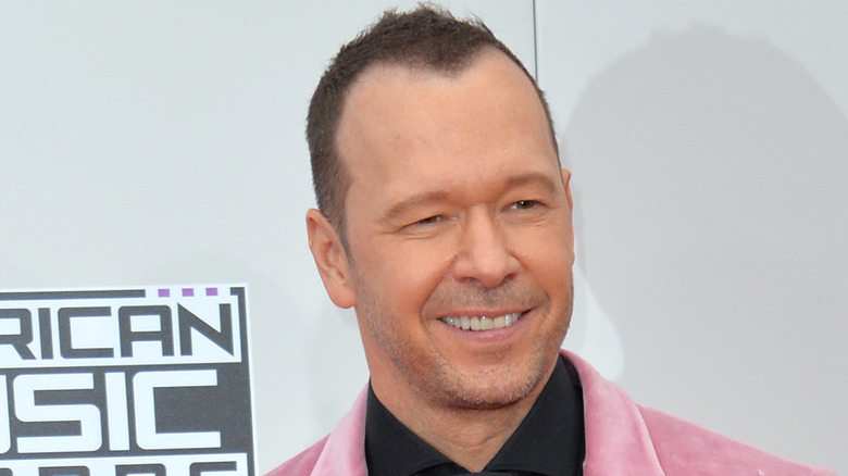 Donnie Wahlberg smiles on the red carpet