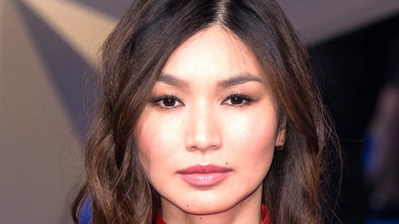 Gemma Chan poses