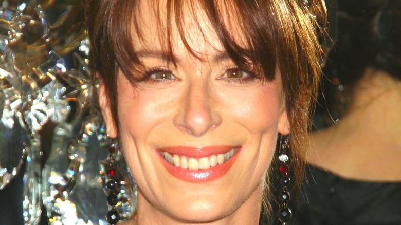 Jane Kaczmarek smiling with bangs