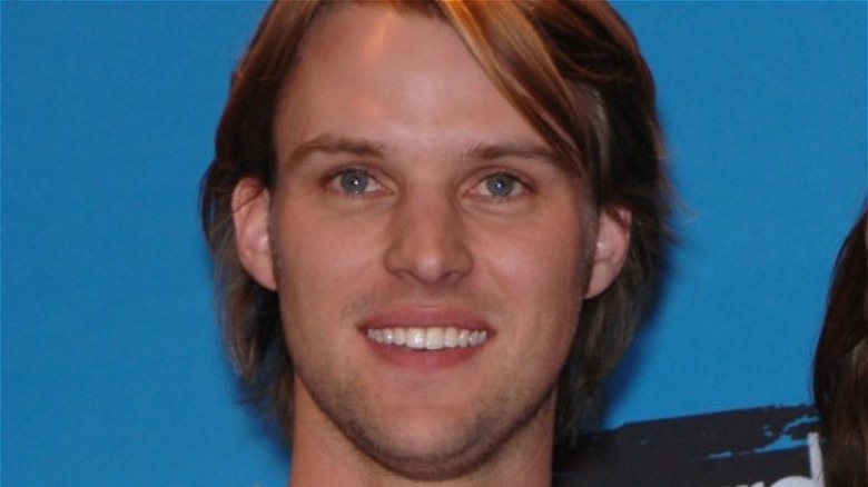 Jesse Spencer smiling for a photo