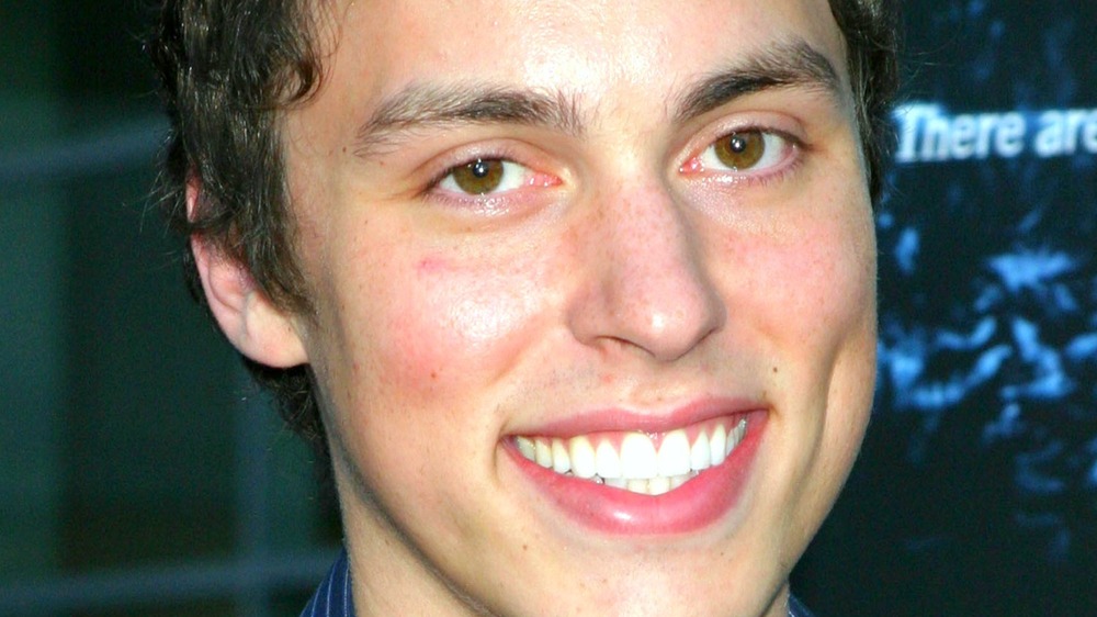 John Francis Daley smiles red carpet