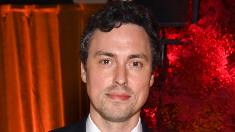 John Francis Daley smiles red carpet