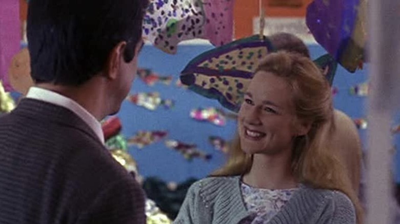 Linney as a school teacher, smiling