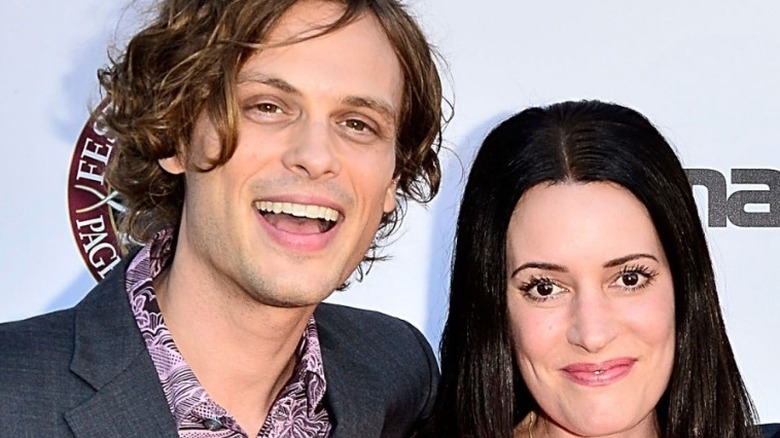 Matthew Gray Gubler and Paget Brewster pose